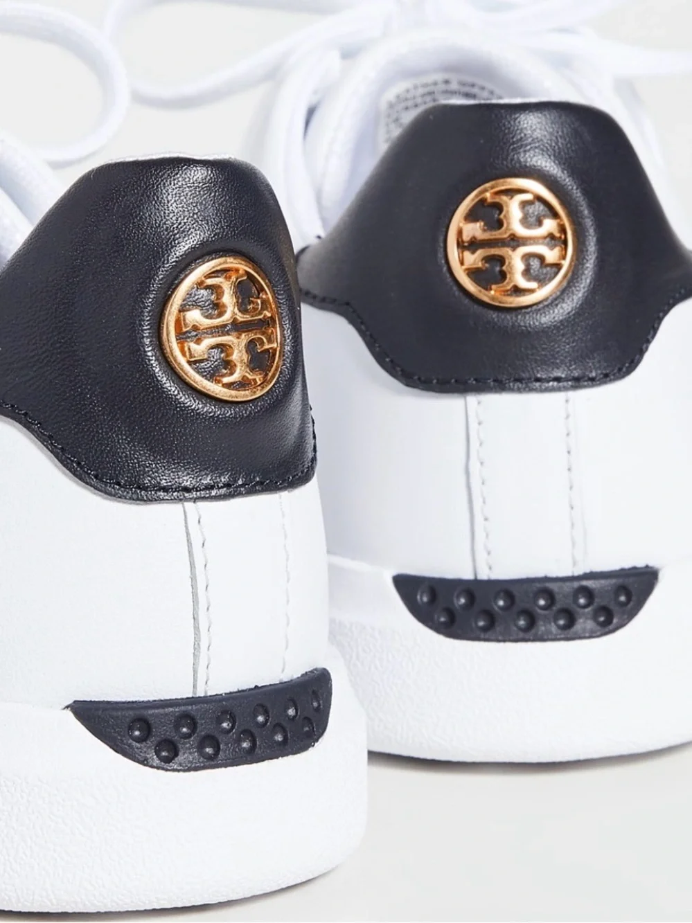 Tory Burch White Leather Sneakers with Black Heel Patch and Gold Emblem